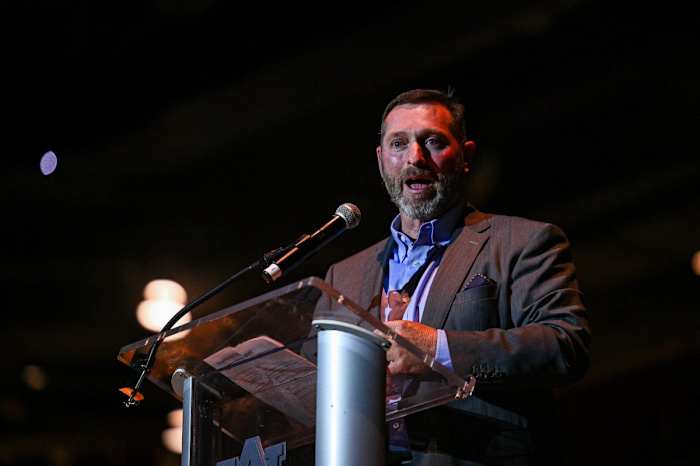 Butch Thompson speaking at Diamond Club banquet